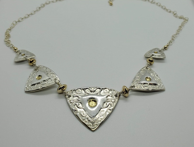 Silver-gold shields on chain (GT1245) by Gabrielle Taylor